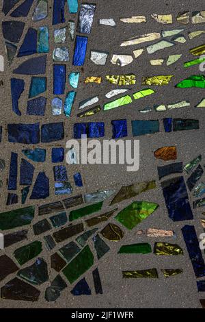 Abstract background, pieces of broken multi-colored glass. Stock Photo