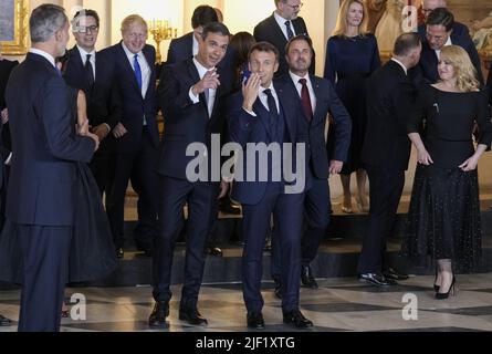 Madrid, Spain. 28th June, 2022. Spain's Prime Minister Pedro Sanchez (C) gestures next to French President Emmanuel Macron after a family photo with other NATO country leaders and delegates before a gala dinner at the Royal Palace ahead of the upcoming NATO Summit, in Madrid, Spain, Tuesday, June 28, 2022. Spain will host a two-day NATO summit starting June 29. Photo by Paul Hanna/UPI Credit: UPI/Alamy Live News Stock Photo