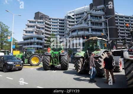 28-06-2022 The Hague,the Netherlands.Farmers protest against measures to cut down nitrogen emissions.  Because of these measures a lot of farmers will be put out of business.After the farmers left,other protesters marched into town,but were boxed in by the police and a few arrests were made. Stock Photo