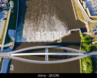 Aerial photograph of the Iowa Women of Achievement Bridge, a pedestrian bridge that spans the Des Moines River. Des Moines, Iowa, USA. Stock Photo