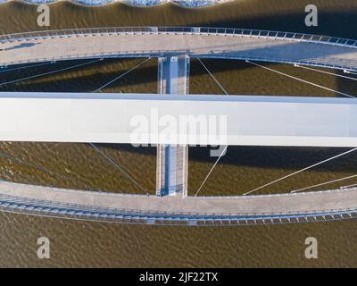 Aerial photograph of the Iowa Women of Achievement Bridge, a pedestrian bridge that spans the Des Moines River. Des Moines, Iowa, USA. Stock Photo