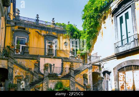 The famous staircases of Palazzo Marigliano, Naples, Italy. Palazzo Marigliano is a historical, renaissance-style palace in Naples city center. Stock Photo