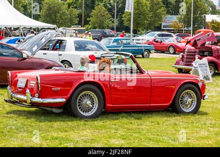 A red 1968 Triumph TR 250 convertible sports car at a car show in Fort Wayne, Indiana, USA. Stock Photo