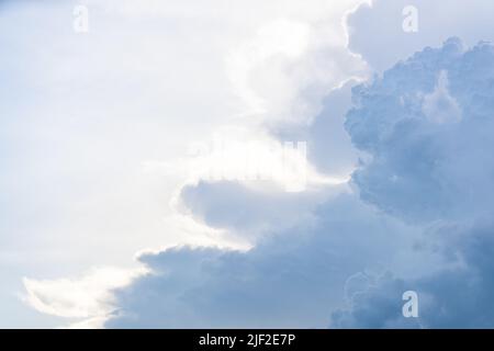 Blue sky with fluffy clouds Stock Photo