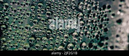 Many Water Rain Drops wet window condensation on glass. Fresh background. Textures formed by bubbles. Collection clear surface. Abstract real photo Stock Photo