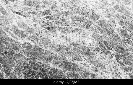 Natural decorative stone, gray marble pattern. Close-up background photo texture, front view Stock Photo