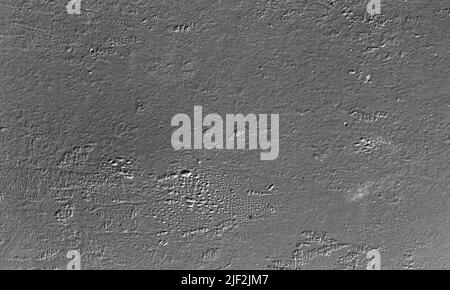 Steel plate painted in gray with relief pattern, close-up monochrome background photo texture Stock Photo