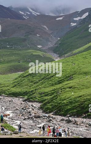 Yining, China's Xinjiang Uygur Autonomous Region. 28th June, 2022. Tourists visit the Narat scenic spot in Xinyuan County, northwest China's Xinjiang Uygur Autonomous Region, June 28, 2022. Credit: Hao Jianwei/Xinhua/Alamy Live News Stock Photo