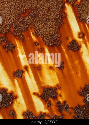 Rusty metal work and orange paint Stock Photo