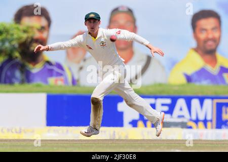 Galle, Sri Lanka. 29th June 2022. Australia's Marnus Labuschagne attempt to stop the ball during the 1st day of the 1st test cricket match between Sri Lanka vs Australia at the Galle International Cricket Stadium in Galle on 29th June, 2022. Viraj Kothalwala/Alamy Live News Stock Photo