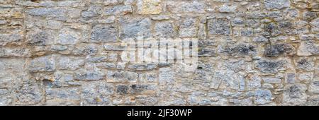historic old wall made with stones Stock Photo