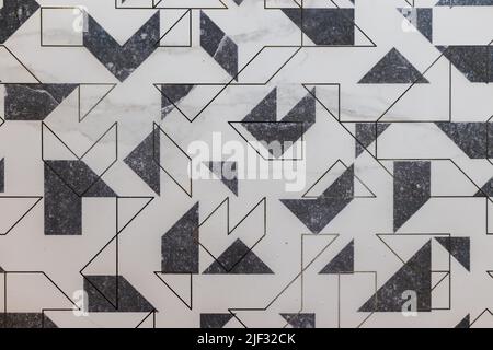 Background of stone tile with decorative stucco texture Stock Photo