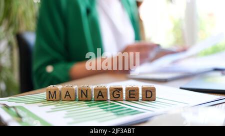 Manager studies business process and successful rules of business Stock Photo