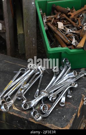 Spanners on an old wooden tool box Stock Photo