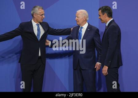 Madrid, Spain. 29th June, 2022. NATO Secretary General Jens Stoltenberg (L) greets President Joe Biden as Spain's Prime Minister Pedro Sanchez looks on during a NATO summit in Madrid, Spain, Wednesday, June 29, 2022. Photo by Paul Hanna/UPI Credit: UPI/Alamy Live News Stock Photo