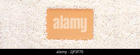 Organic soy wax on beige background with copy space for design, text. Top view. frame border of vegan wax. Mockup blank copy space. Flat lay. Banner Stock Photo