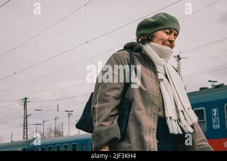 March 9, 2022, ZÂ·hony, Szabolcs-SzatmÃr-Bereg, Hungary: A Ukrainian woman is walking to the registration office. The train station in ZÃhony is the main access point of Hungary for thousands of refugees fleeing the Russian invasion. (Credit Image: © Lara Hauser/SOPA Images via ZUMA Press Wire) Stock Photo