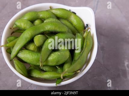 Organic edamame cooked with sea salt Stock Photo