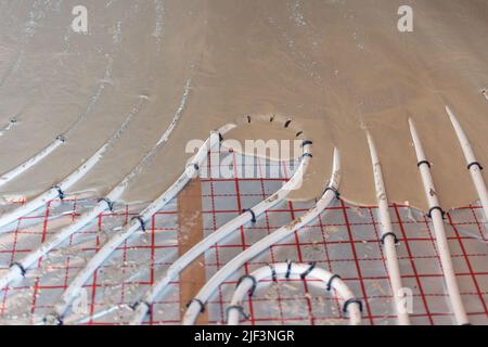 Floor plumber heating system, underfloor plumber heating concept, a building concept Stock Photo
