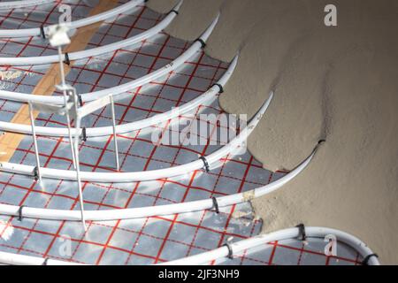 Floor plumber heating system, underfloor plumber heating concept, a building concept Stock Photo