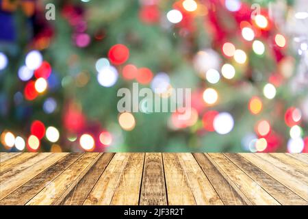 Christmas and new year holiday background with empty wooden deck table over festive bokeh. Ready for product montage Stock Photo