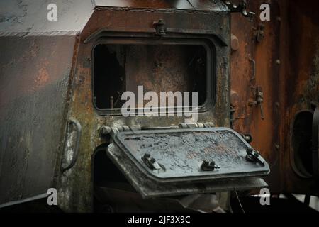 Detail of damage of a Russian tank is seen near the Royal Castle in Warsaw, Poland on 28 June, 2022. Two destroyed Russian army tanks are on display o Stock Photo