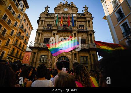 Pamplona, Spain. 28th June, 2022. Demonstrators celebrate with flags during the Gay Parade on the streets of Pamplona. Hundreds of people demonstrated through the streets of Pamplona, on the occasion of the celebration of Gay Pride, drag queens, flags flowed on the streets in vindication of the rights of the LGTBQ   collective. (Photo by Elsa A Bravo/SOPA Images/Sipa USA) Credit: Sipa USA/Alamy Live News Stock Photo