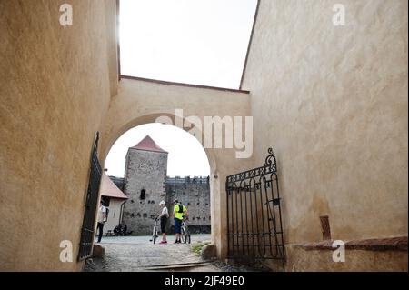 Brno, Czech Republic - April 30, 2022: People in bicycles in Veveri castle, Czech Republic. Stock Photo