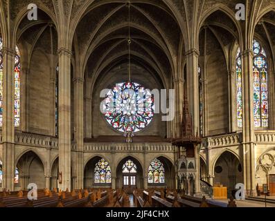 Lovely view of the left-hand transept rosette, named Martyr window, inside the Memorial Church of the Protestation in Speyer, Germany. The rose window... Stock Photo