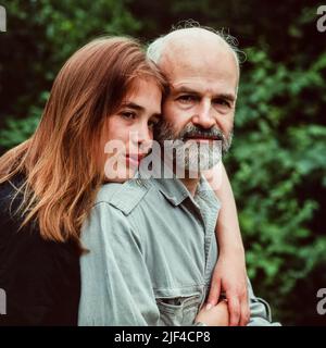 Terry Pratchett with daughter Rhianna Pratchett at home. Stock Photo