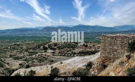 One of the most precious treasures of ancient Greece, hidden in the heart of the Peloponnese peninsula, is the city of Mycenae, a UNESCO Site. Stock Photo