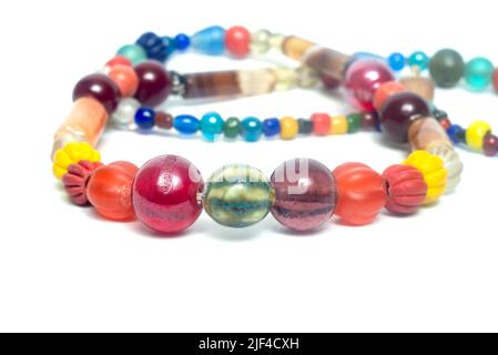 Ancient beads multicolored Thailand isolated on white background. Stock Photo