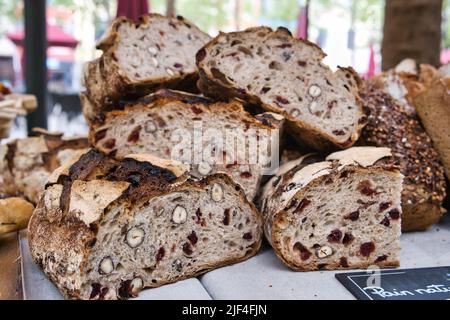 Close up of bread with hazelnuts at the open air market in Carcassonne Stock Photo