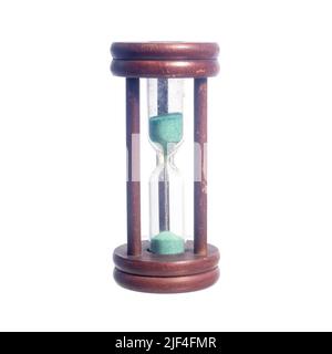 Antique hourglass using green sand isolated on a white background. Stock Photo