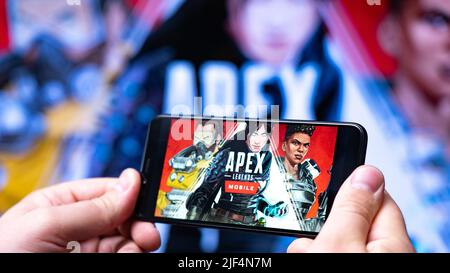 Nova Lima, Brazil - June 2022: Hands holding a smartphone with