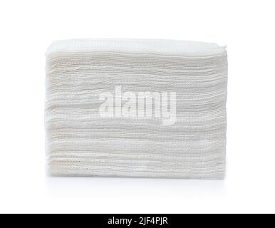 Stack of square white paper napkins isolated on white Stock Photo