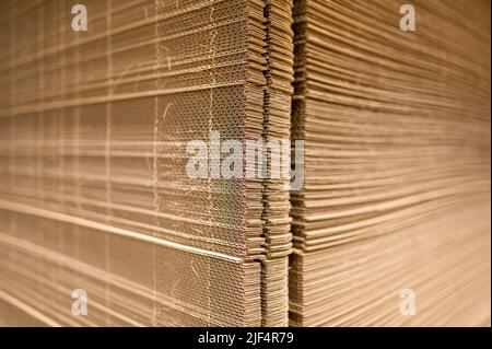 Corrugated cardboard for packing. abstract background horizontal lines with wavy lines of beige color Stock Photo