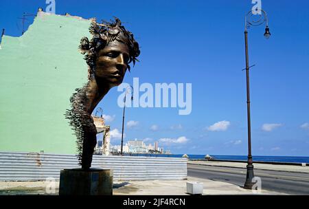 Havana, Cuba, circa May 2022: Modern art at a rotten green buildung at havanas malecon Stock Photo