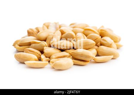 Roasted peeled peanuts isolated on a white background. Stock Photo
