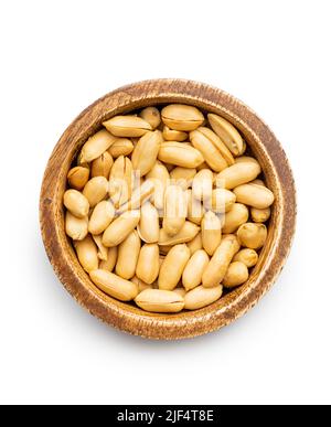 Roasted peeled peanuts in bowl isolated on a white background. Stock Photo