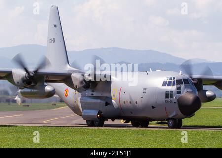 A Spanish Air Force Hercules military transport aircraft taxiing at airbase Zeltweg in Austria to the runway with turning propellers Stock Photo