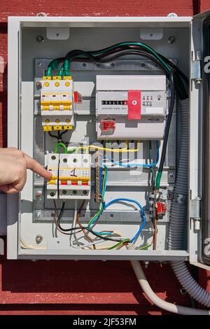 Electricity meter and circuit breakers in consumer unit. Stock Photo