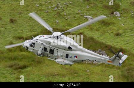 The Royal Netherlands Navy flying the Mach Loop in wales in there NH90. In N318 aircraft. The aircraft is currently at RNAS Culdrose. Stock Photo