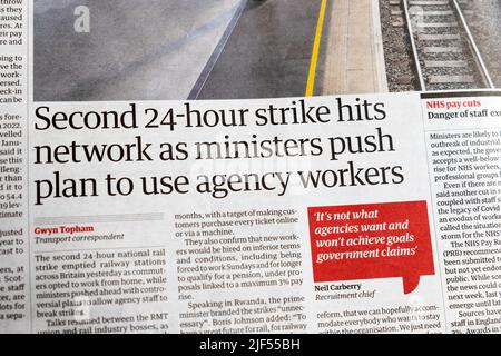 'Second 24-hour strike hits network as ministers push plan to use agency workers' Guardian newspaper headline rail strike 23 June 2022 London UK Stock Photo