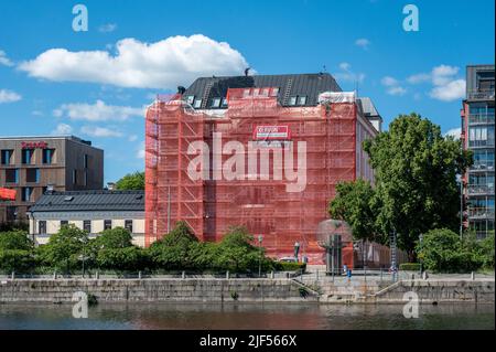 Roof job on a residential building at Saltangen along Motala river in Norrkoping, Sweden Stock Photo