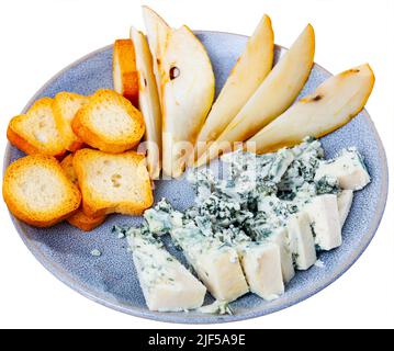 Blue cheese served on plate with pear Stock Photo