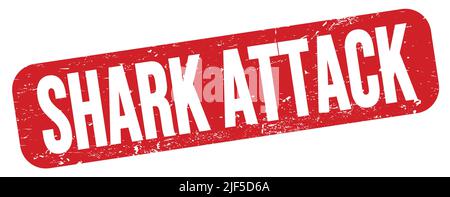 SHARK ATTACK text written on red grungy stamp sign. Stock Photo