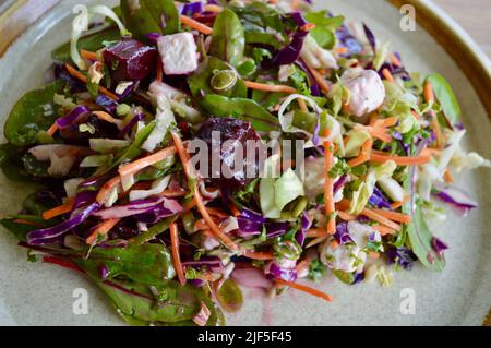 Beetroot and feta salad on a plate ready to eat Stock Photo