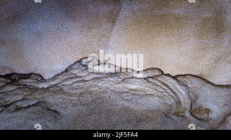 Up close layered cut sandstone background Stock Photo