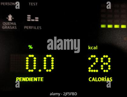 Digital Display Showing Calories and Incline on Exercise Machine Stock Photo